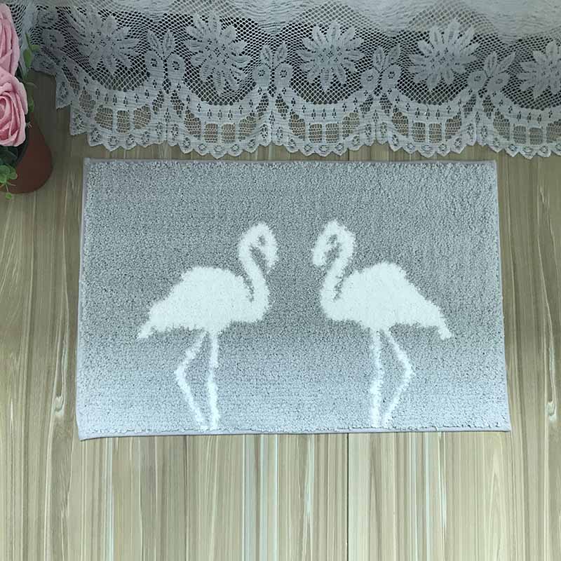 Quick-dry feature and jacquard bath mat